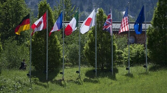 Photo: The flags of the G7 members and the European Union in front of "Schloss Elmau"