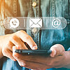 Hand of Businessman holding mobile smartphone. Contact Us, customer support concept. copy space.