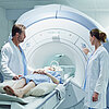 Doctors preparing patient for MRI scan